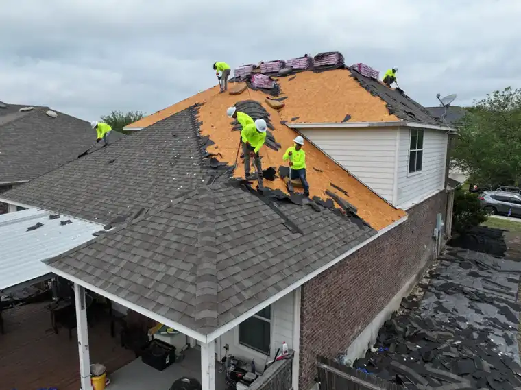 DNA Restoration & Construction roofing crew at work