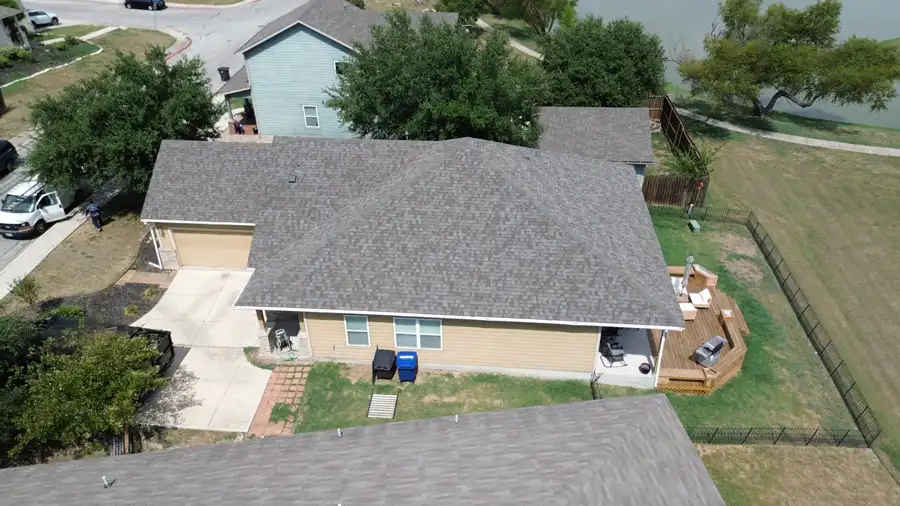 Storm damage roof replacement by DNA Restoration & Construction