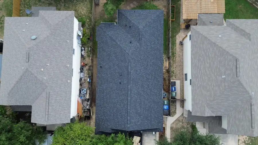 Side-by-side neighborhood re-roofs by DNA Restoration & Construction