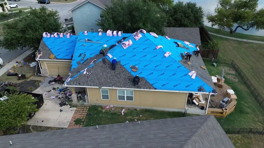 Full tear-off to underlayment by DNA Restoration & Construction