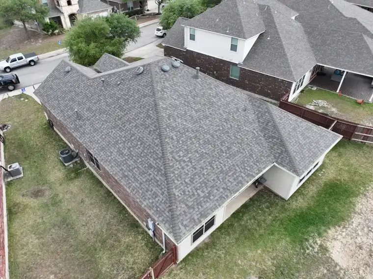 Neighborhood re-roof by DNA Restoration & Construction