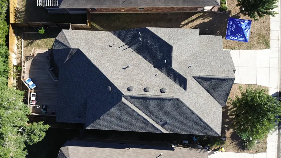 Completed roof replacement, overhead drone view by DNA Restoration & Construction